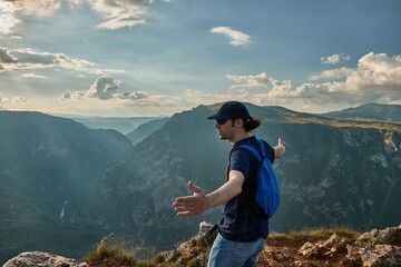 High mountain landscape view in the Dinaric Alps in Montenegro, Man enjoying view