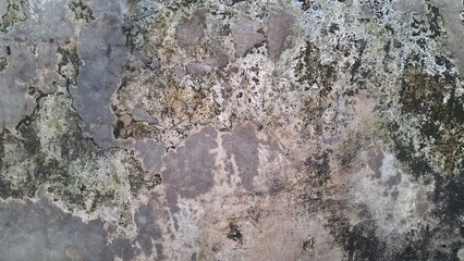 Old grunge concrete surface with weathered cement texture and rough stone patterns, ideal for industrial backgrounds