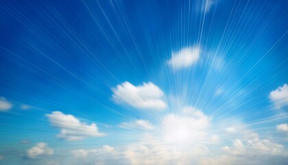 blurred of a blue sky with sun ray background and clouds