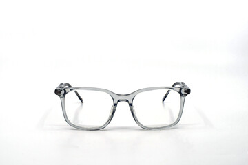 Pair of glasses with transparent grey frames isolated ona plain white background. Eyesight and...