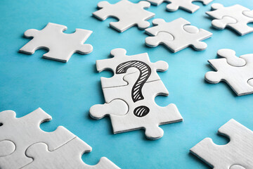 Fototapeta premium Puzzle Pieces with Question Mark