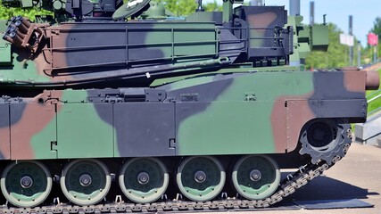 Caterpillar of a modern tank. Undercarriage with tracks and slides of military.