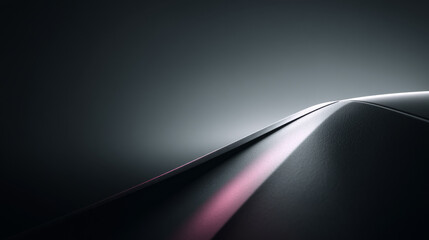 A sleek and modern abstract design showcasing curves and gradients in a dark environment.