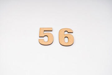 Number fifty-six on paper on white background