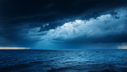 Fototapeta premium dark with dramatic blue sky and dark as dramatic blue sea color and dark storm raining cloud background