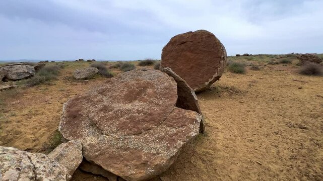 View of the valley of stone balls. Mangystau region.Unique natural places of Kazakhstan. Valley of the Balls. Spherical formations in the Torysh tract were formed about 120-180 million years ago. 4К
