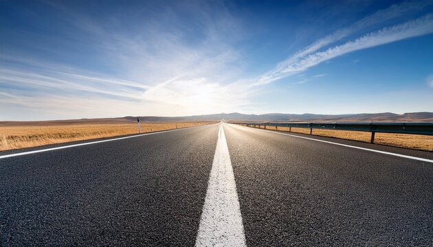asphalt road with white lines isolated evoking the vastness of a highway or motorway ideal for travel journey or road trip imagery