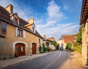 Obraz premium vezelay charming street scene school street france historic village medieval architecture