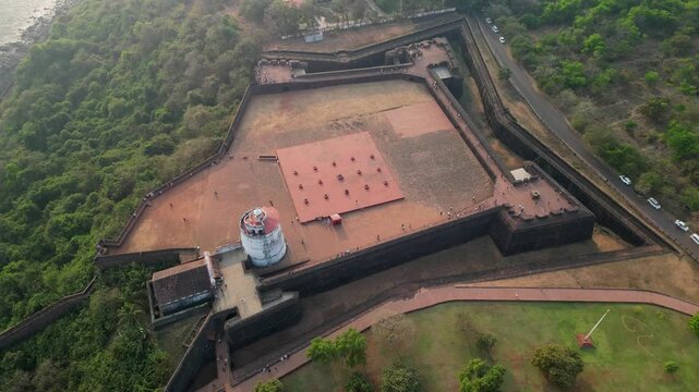 Fort Aguada walls and lighthouse overlook Goa's blue seacoast
