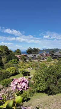  Coastal Village View from a Hill on a Sunny Day
