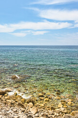 
Budva, Montenegro - May 04, 2024 : The Old Town Fortress in Budva. A stone wall on the shore of the Adriatic Sea in Montenegro. Horizontal. On a hot, sunny, spring afternoon.