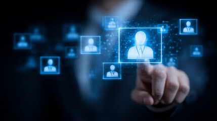 Obraz premium Businessman selecting candidate icon from digital interface representing human resources