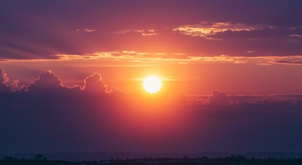 Obraz premium Dramatic Sunset Landscape Vibrant Orange and Purple Sky with Clouds