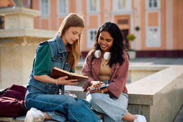 Plakat Happy female university friends studying at campus.