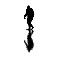 Solid black silhouette of a bigfoot lurking