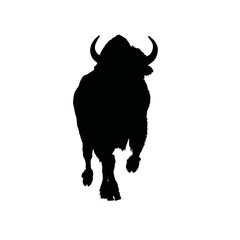 Solid black silhouette of a bison charging © John