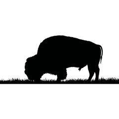 Solid black silhouette of a bison grazing
