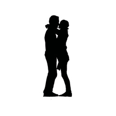Solid black silhouette of a couple hugging