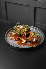 Side View of Tender Meat with Artistic Sauce