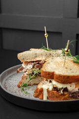Side View of Layered Sandwich on Plate
