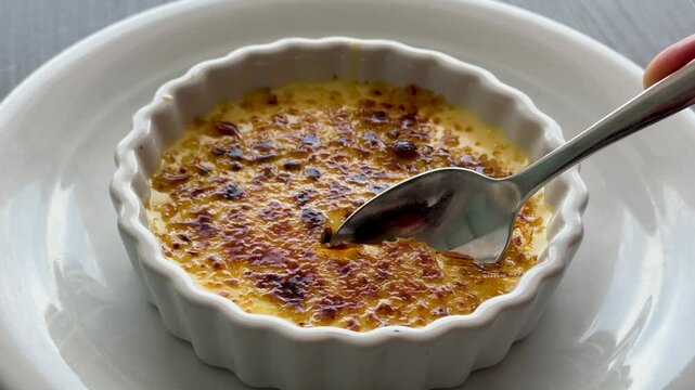 Closeup of Eating Creme Brulee