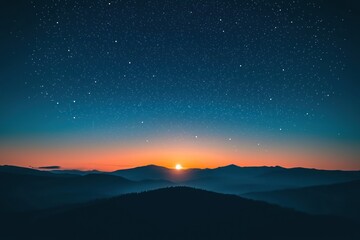 Fototapeta premium Sunrise over Mountain Range at Night
