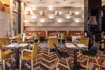 Stylish modern restaurant interior with cozy seating