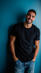 Fototapeta premium Smiling Man Portrait Casual Jeans T-shirt Wall Happy Young Male Relaxed Positive Style Modern Clothing Confident Handsome Playful Sitting Grooming Urban Lifestyle Expression Outdoors Fun Mood 