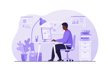 Person Working at Desk on Computer with Graphs and Charts