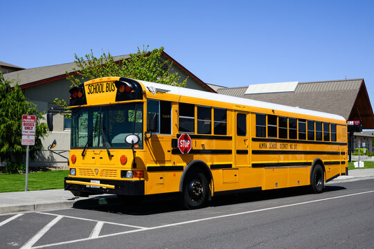 Coolie City, WA, USA - May 1, 2025; School bus by IC Bus on town street for Almira school district 17