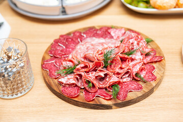 Charcuterie platter with assorted cured meats.