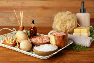 Composition with spa accessories on wooden background