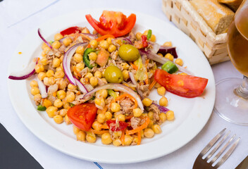 Spanish salad with chickpeas, cod and vegetables - empedrado garbanzos
