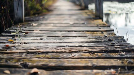 Weathered Wooden Bridge Leading To Water With Natural Texture and Scenic Environment