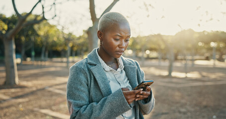 Business, serious and black woman in city, smartphone and mistake with error 404. African person,...