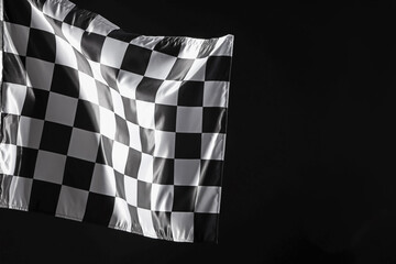 One racing checkered flag on black background, space for text