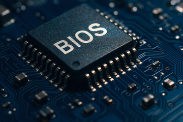 Close up of computer engineering BIOS chip on blue circuit board with electronic components and microchip connections