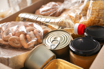 Many different food products in box, closeup