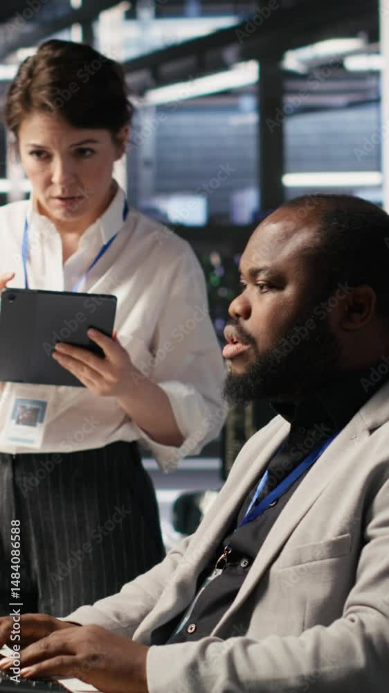 Poster vertical video server room manager supervise technician examining deep learning algorithms. data cen
