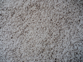 Textured Wall Surface with Beige and Brown Patterns