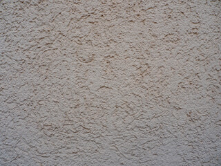 Textured Stucco Wall with Neutral Beige Finish