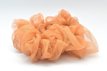 brown hair tie isolated on white