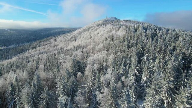 winter landscape mountains forest drone flyby blue sky