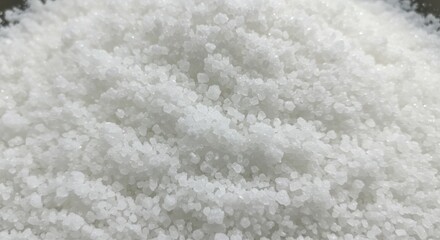Pile of white crystals implying purity and cleanliness, with granular texture