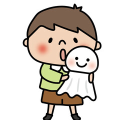 大きなてるてる坊主を持っている子供（男の子2）