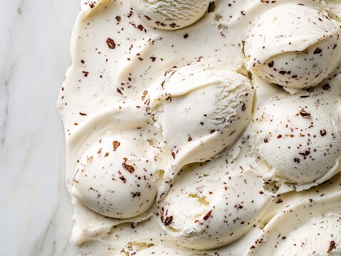 Creamy vanilla ice cream with chocolate sprinkles.