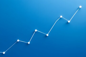 A simple white line graph on a blue background, representing an upward-trending sales curve with four small dots connected by straight lines to represent growth in the chain of data points