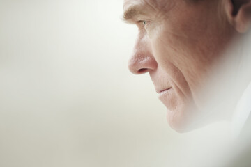 portrait of prosecutor with stern expression positioned on left side of frame