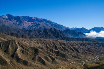 Impressive Andes Mountain Range (Cordillera de los Andes) from the Road – Majestic Peaks, Vibrant Colors, Panoramic Scenic Drive, Argentina Border Landscape, Tourist Attraction