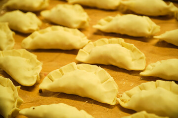 Argentinean Empanadas ready to bake in the oven, traditional food from Argentina.